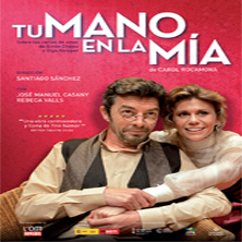 Tu mano en la m&iacute;a